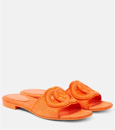 gucci orange slides|gucci gg cutout slides.